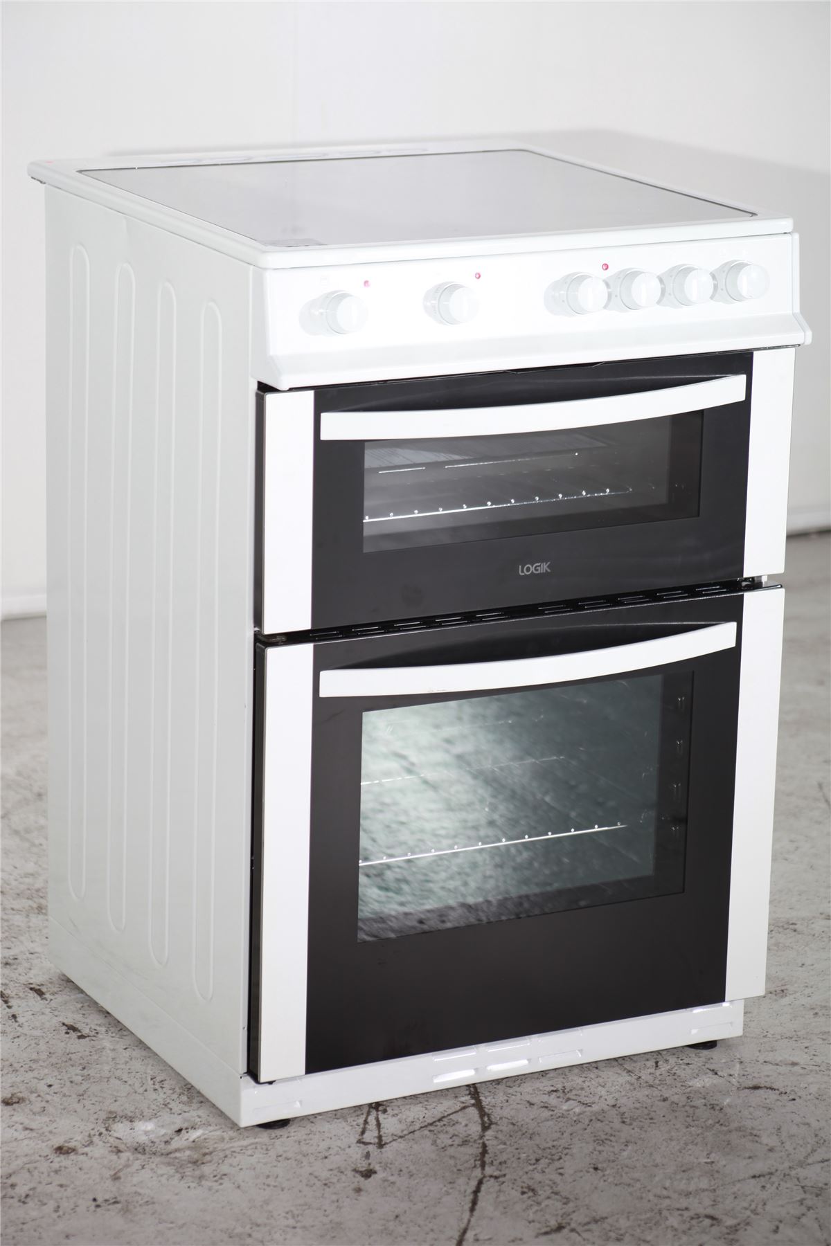 Preloved logik electric cooker lftc60w12 black & white for sale